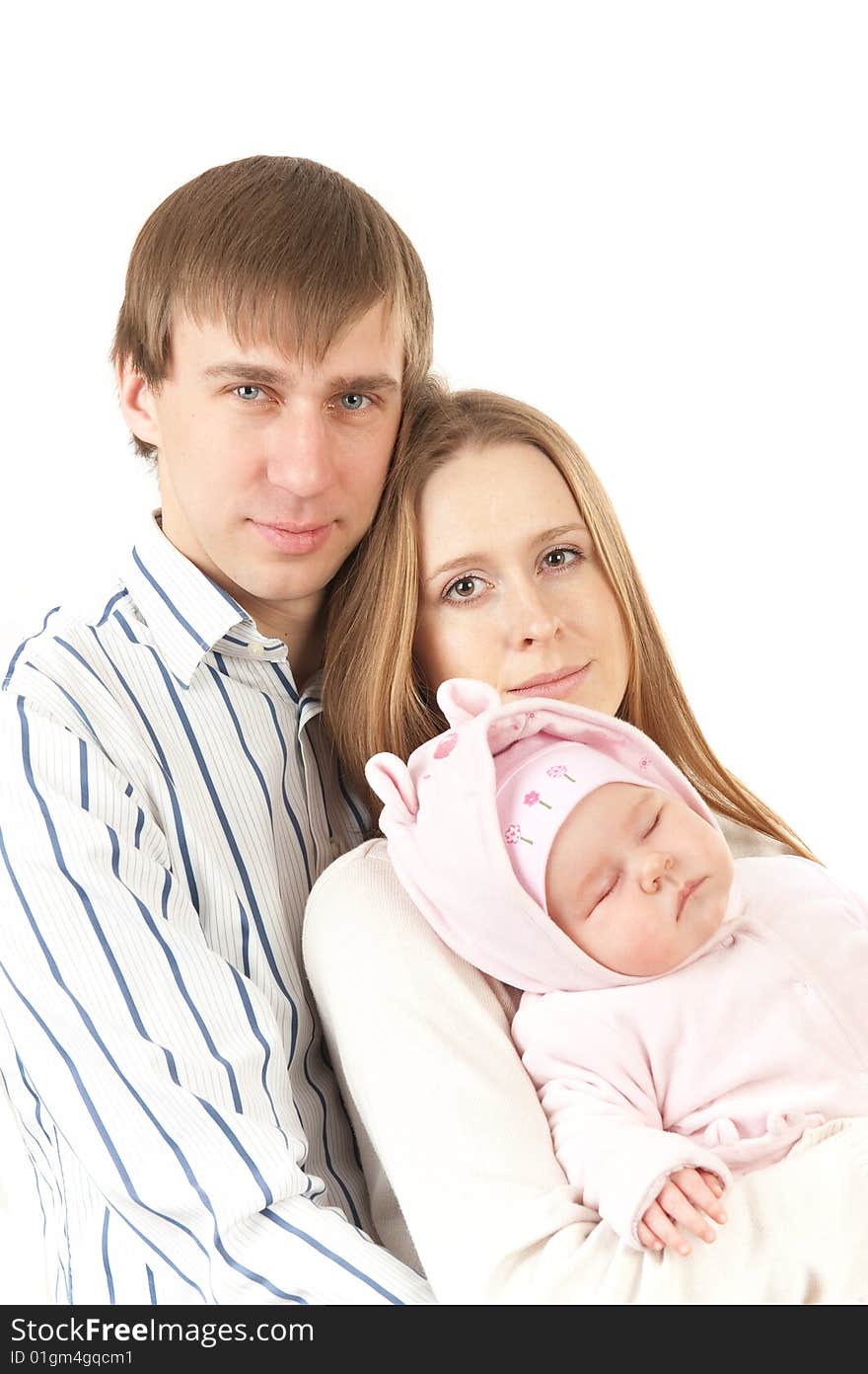 Happy mother and father holding a young baby girl. Isolated on white background. Happy mother and father holding a young baby girl. Isolated on white background.