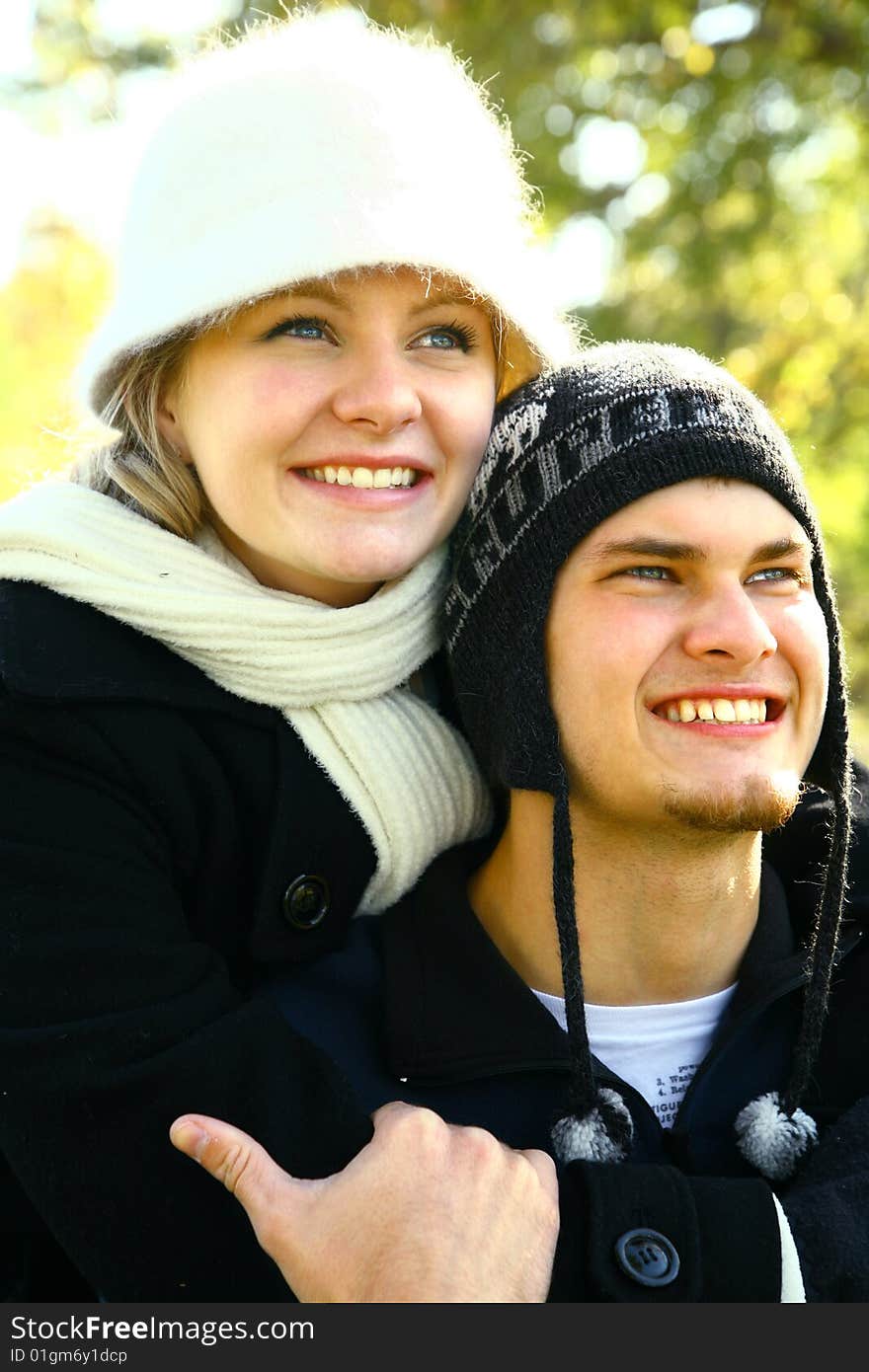 Happy young couple in urban lifestyle enjoying park environment. Happy young couple in urban lifestyle enjoying park environment