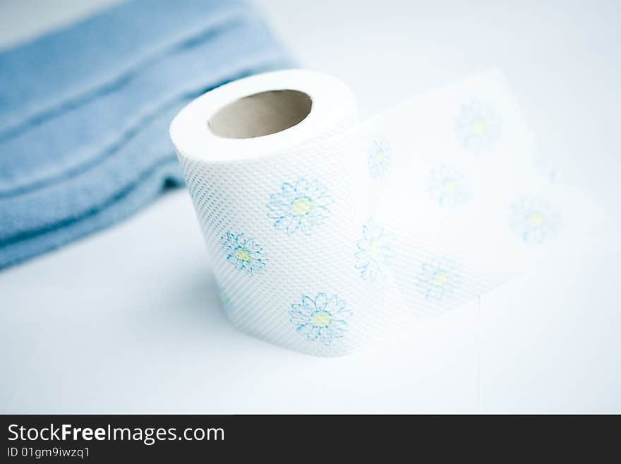 Toiletpaper rolls against bright blue background