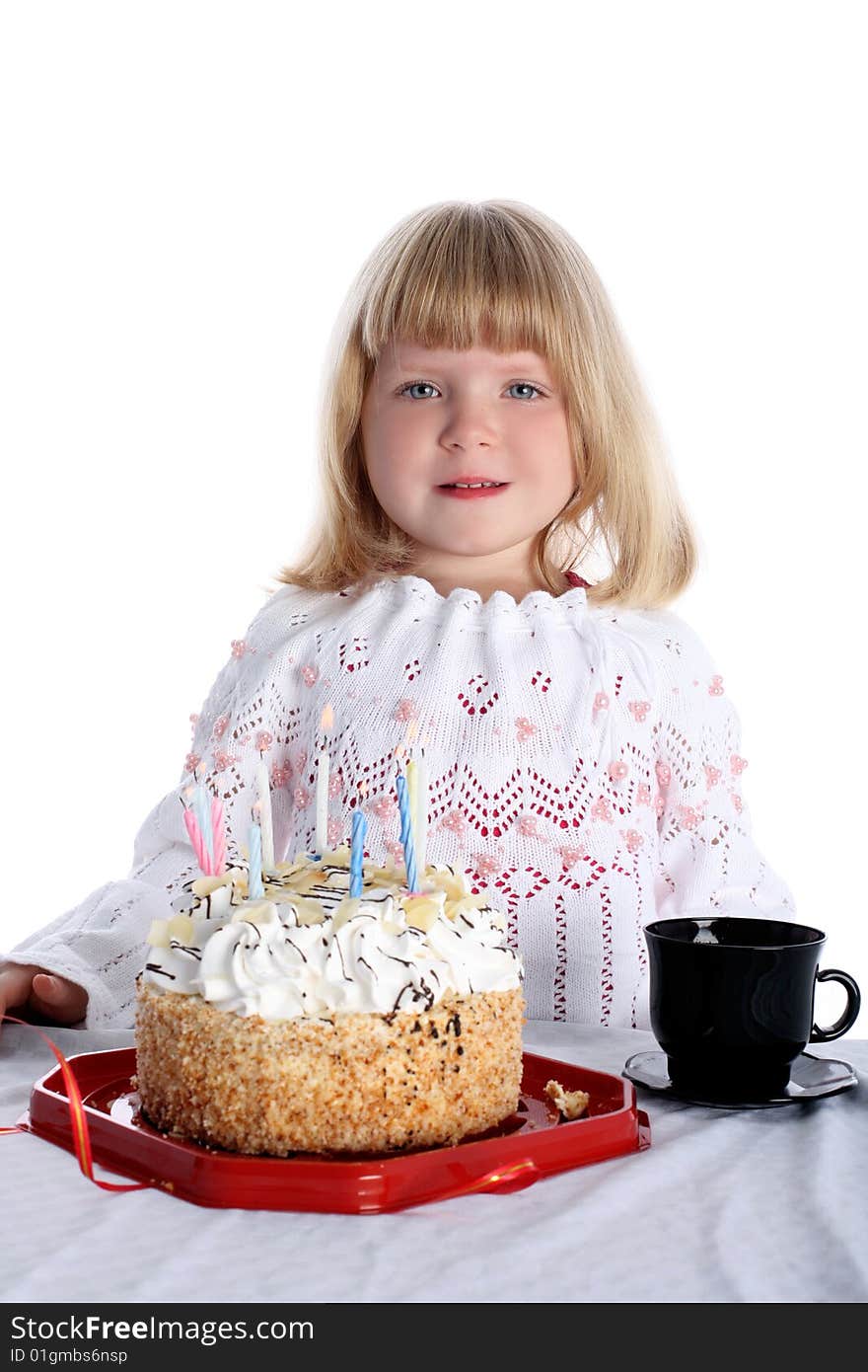 Little girl with birthday cake isolated on white