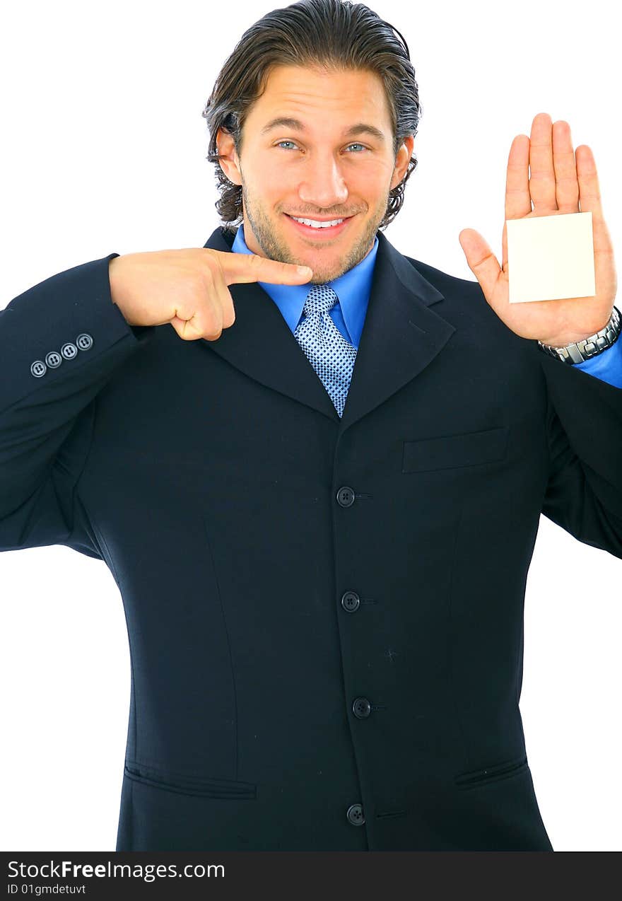 Happy young businessman showing and point to his hand with empty post it note. Happy young businessman showing and point to his hand with empty post it note