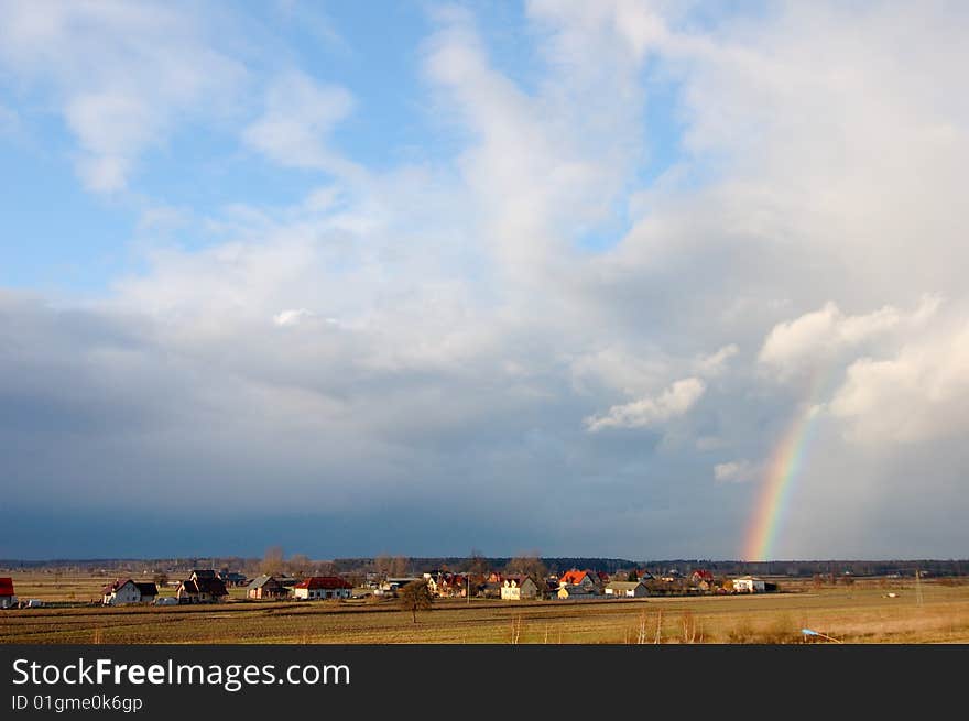 Rainbow on the blue sky