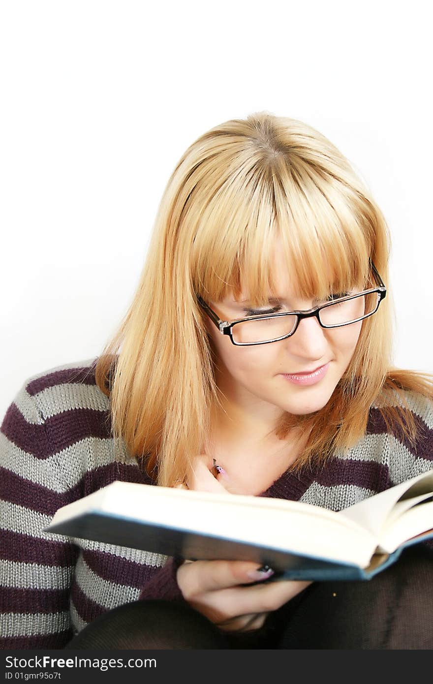 Portrait of a  young lady reading book with  cup in hand. . Isolated over white background. Portrait of a  young lady reading book with  cup in hand. . Isolated over white background