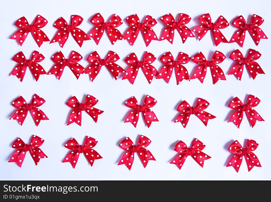 Red fabric bows, tied by hand. Red fabric bows, tied by hand.