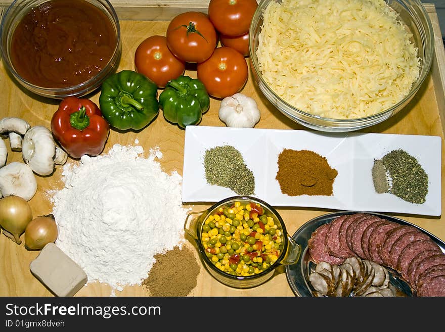 Top view at table full of fresh pizza ingredients. Top view at table full of fresh pizza ingredients