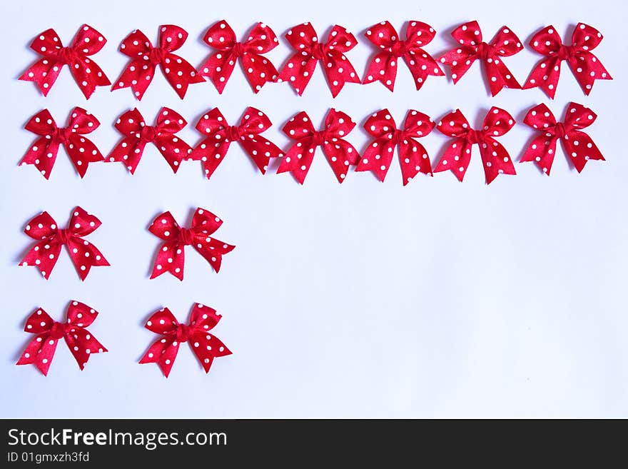 Red fabric bows, tied by hand. Red fabric bows, tied by hand.