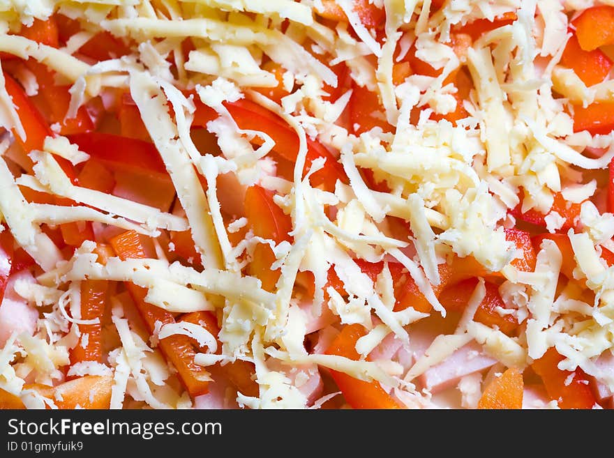 Stock photo: an image of a background of food: sausage, paprika and cheese