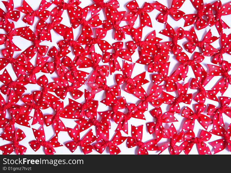 Red fabric bows, tied by hand. Red fabric bows, tied by hand.