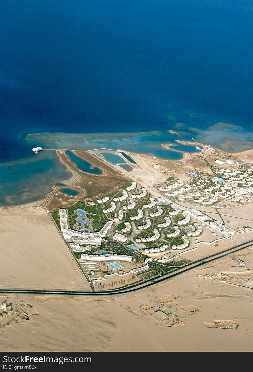 A kind is from above on transparent turquoise waters of Red sea and complexes of hotels Hurghada. A kind is from above on transparent turquoise waters of Red sea and complexes of hotels Hurghada