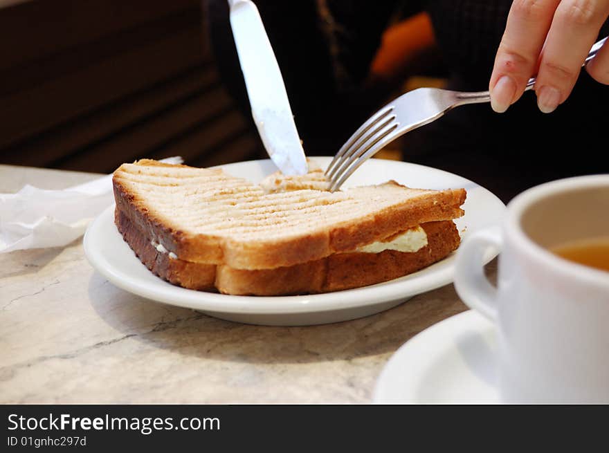 Lunch - smbdy eats toast with vegetables