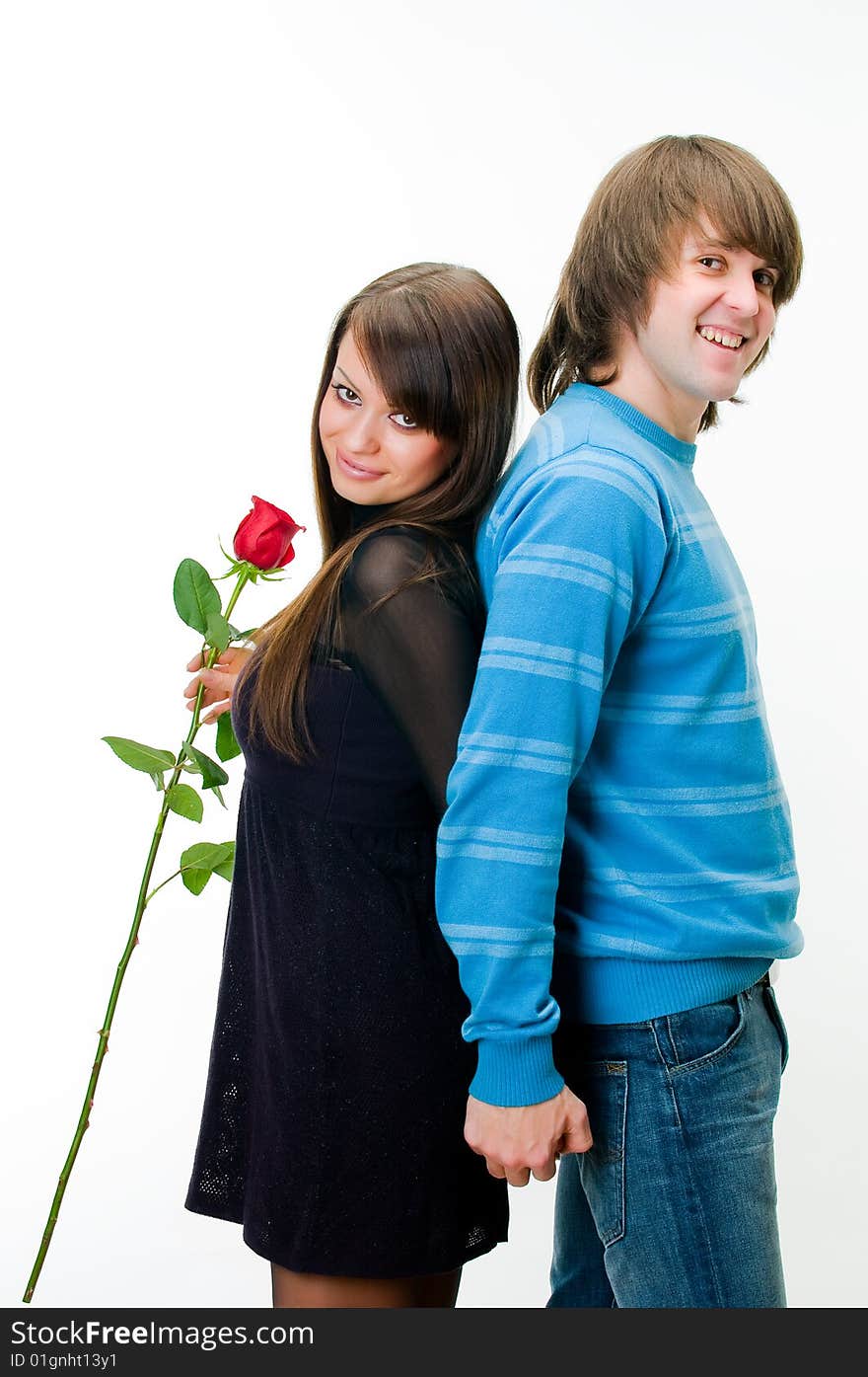 Young couple with rose, isolated on white background