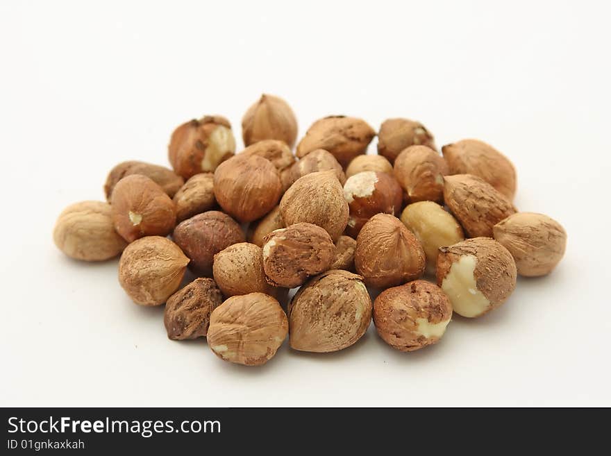 Isolated hazelnuts on white bacground