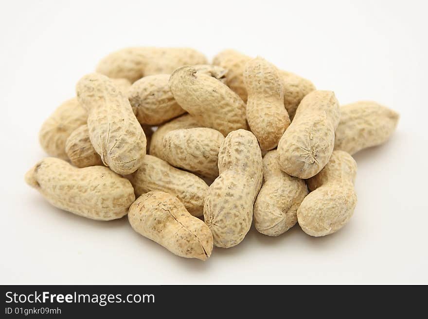 Isolated peanuts on white background