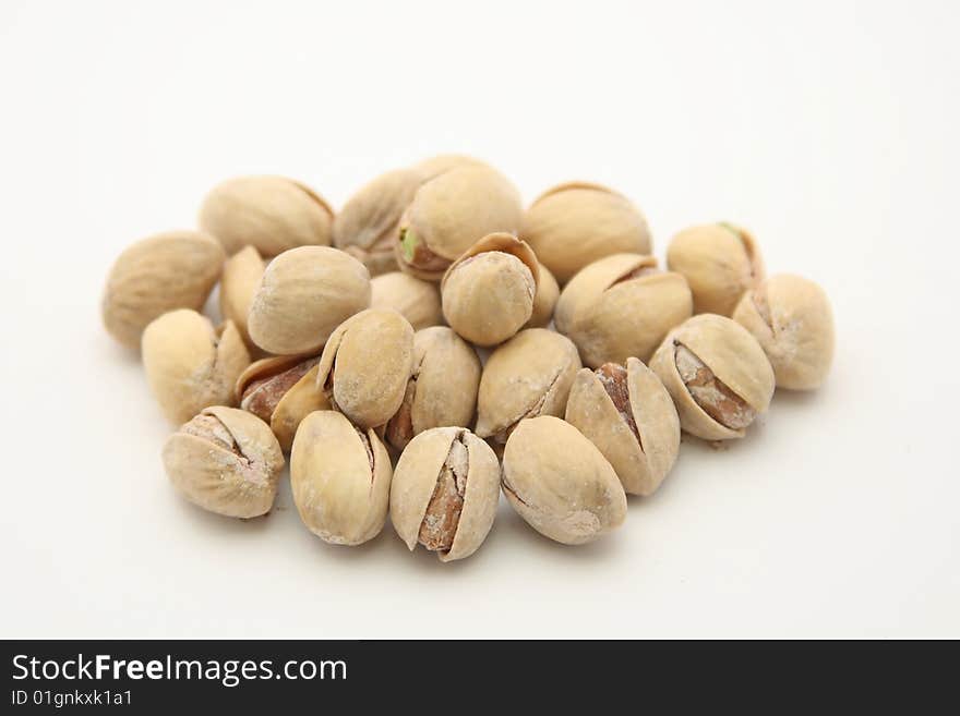 Isolated pistachios on white background