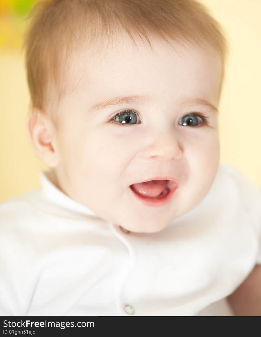 Portrait of adorable blue-eyes baby