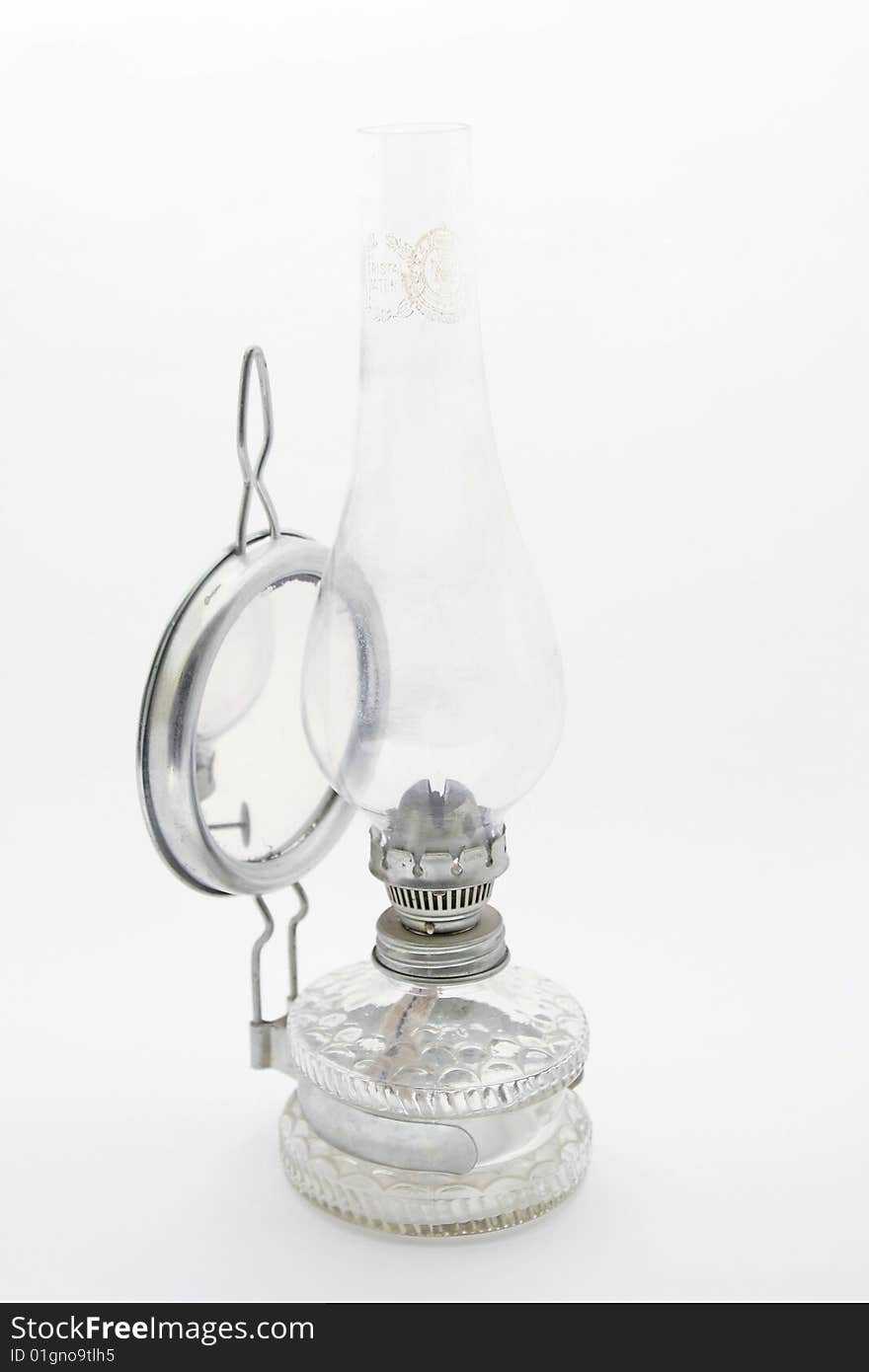 Old petroleum lamp on white background. Old petroleum lamp on white background