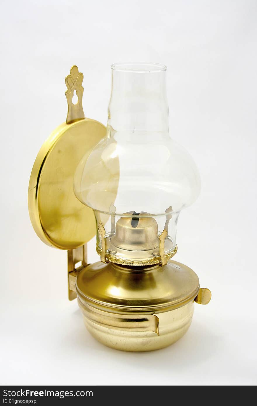 Used old petroleum lamp on white background