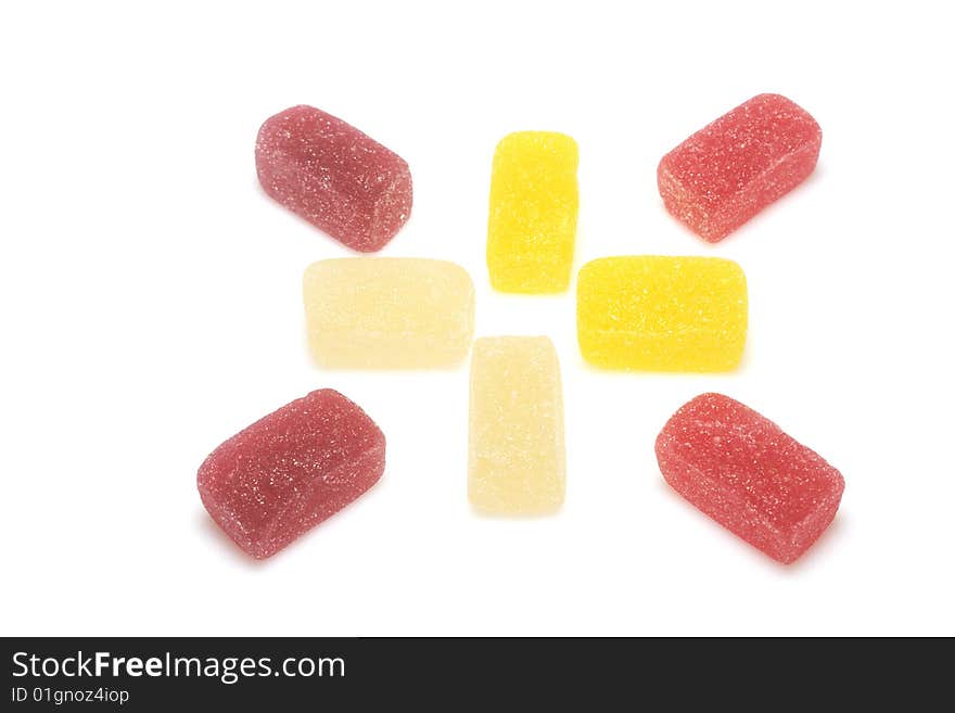 Many-colored candies isolated over white