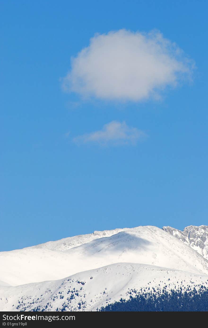 A cloud above moutain in Jasper town, Alberta, Canada. A cloud above moutain in Jasper town, Alberta, Canada