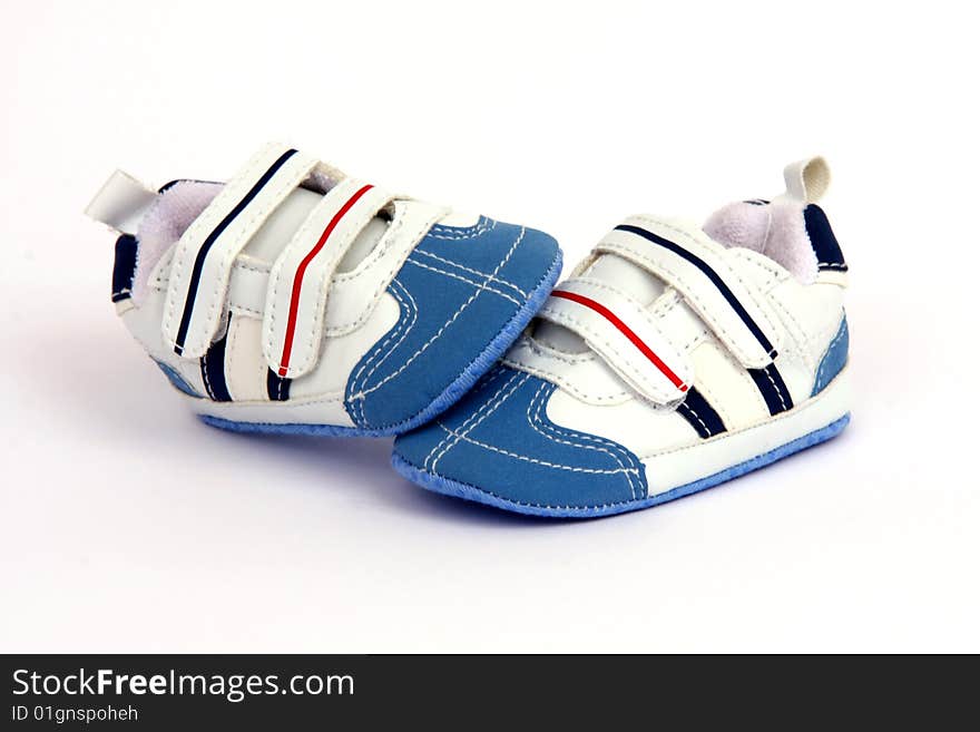 Very small newborn baby shoes isolated. Very small newborn baby shoes isolated