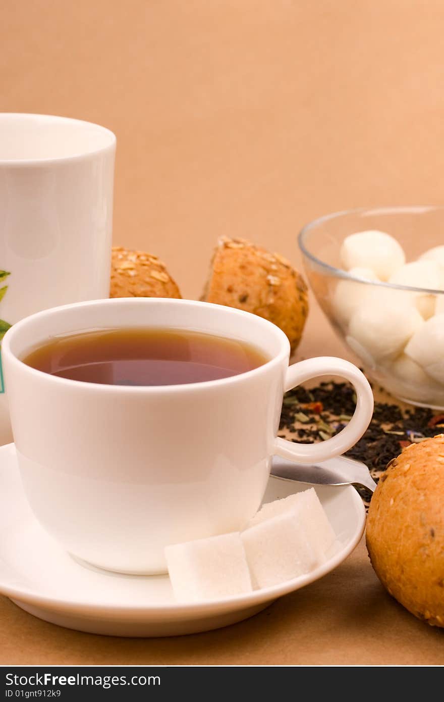 Cup of tea, mozzarella and bread closeup