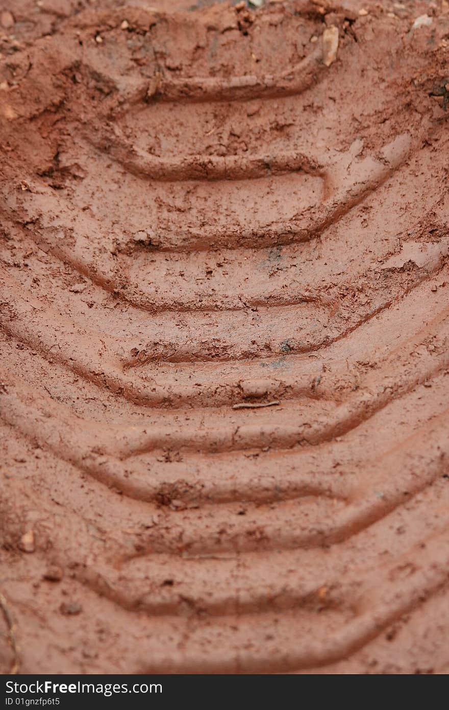 Tractor Tire treads in the mud