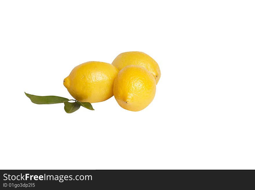 Three lemons with leaves isolated  on a white background. Three lemons with leaves isolated  on a white background.