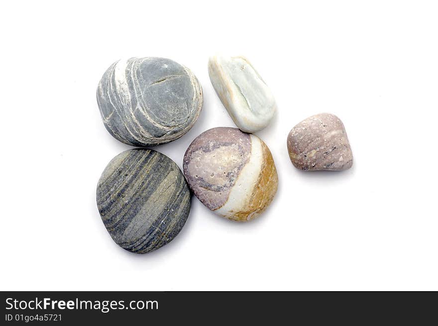 Beautiful colorful nature stones on white