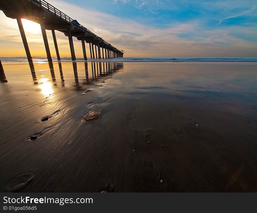 Sunset, Pier, and Jellyfish