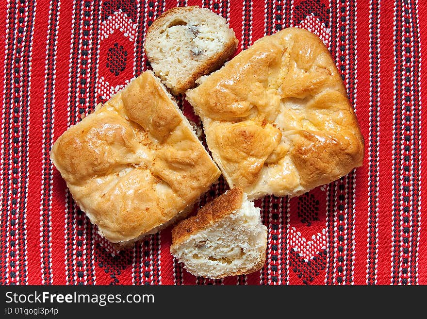 Romanian trditional bakery on red striped towel. Romanian trditional bakery on red striped towel