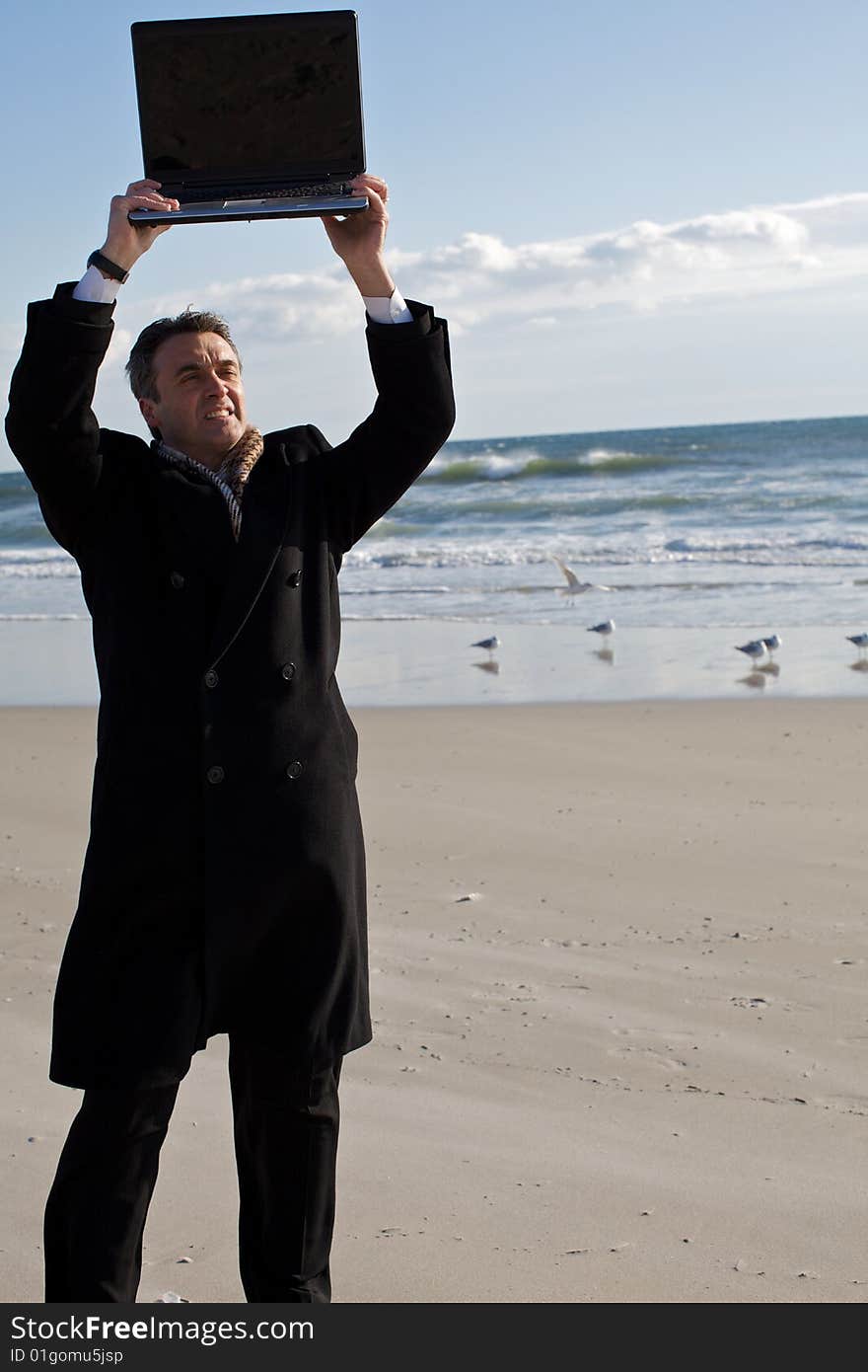 Businessman on the beach