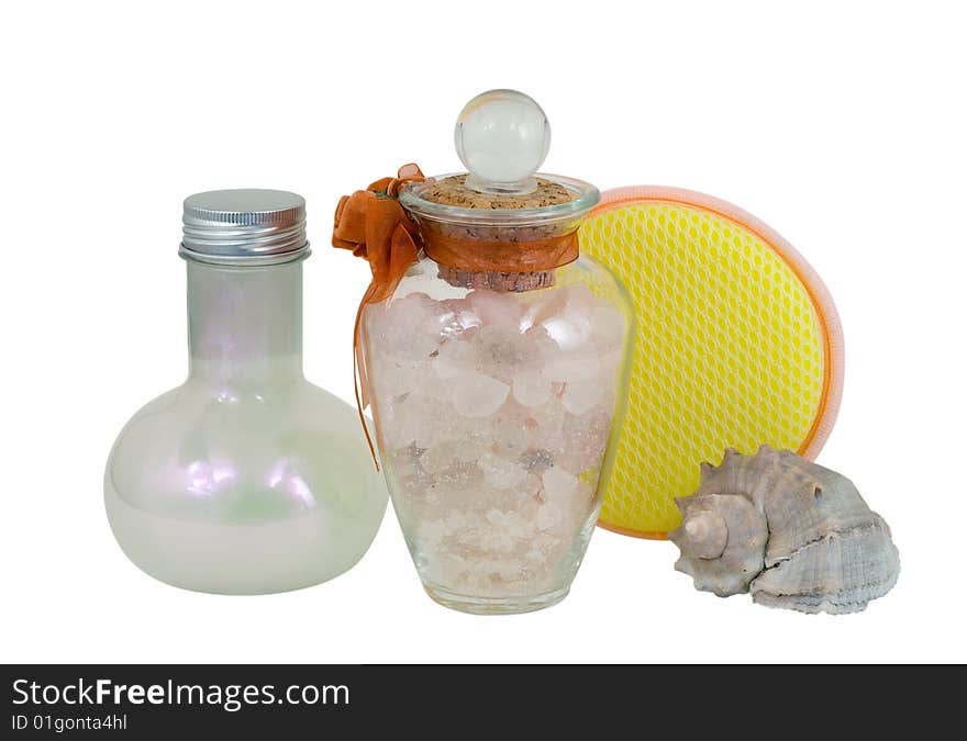 A close-up of the perfumery for bath (aromatic salt, foam) and facecloth and shell. A close-up of the perfumery for bath (aromatic salt, foam) and facecloth and shell.