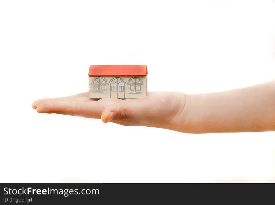 Toy house on human hand. Toy house on human hand