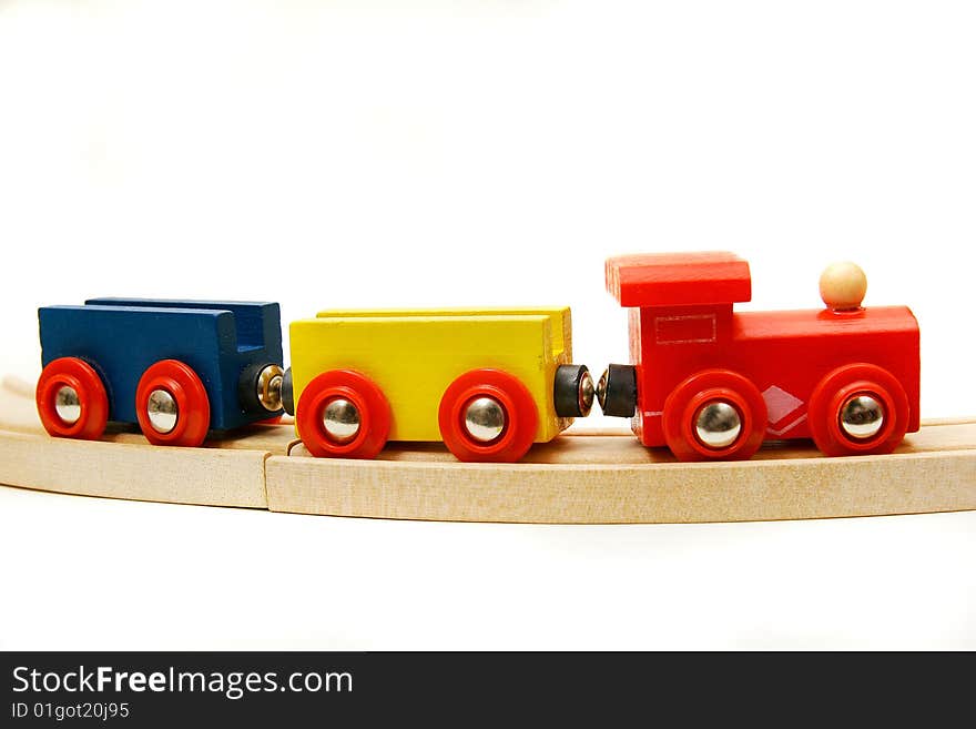 Wooden train over white background