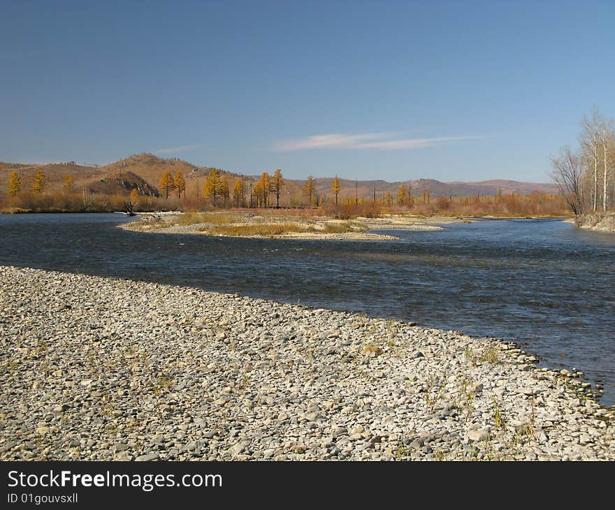 Autumn colors in landscape with blue sky in wildness. Autumn colors in landscape with blue sky in wildness