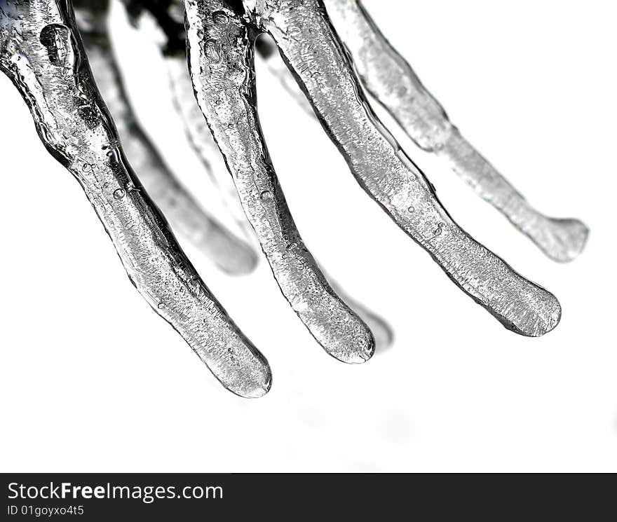 Few icicles on white background