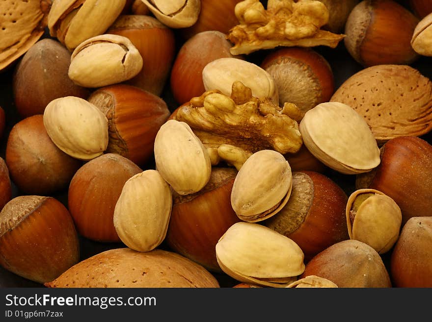 Detail of many types of peanuts