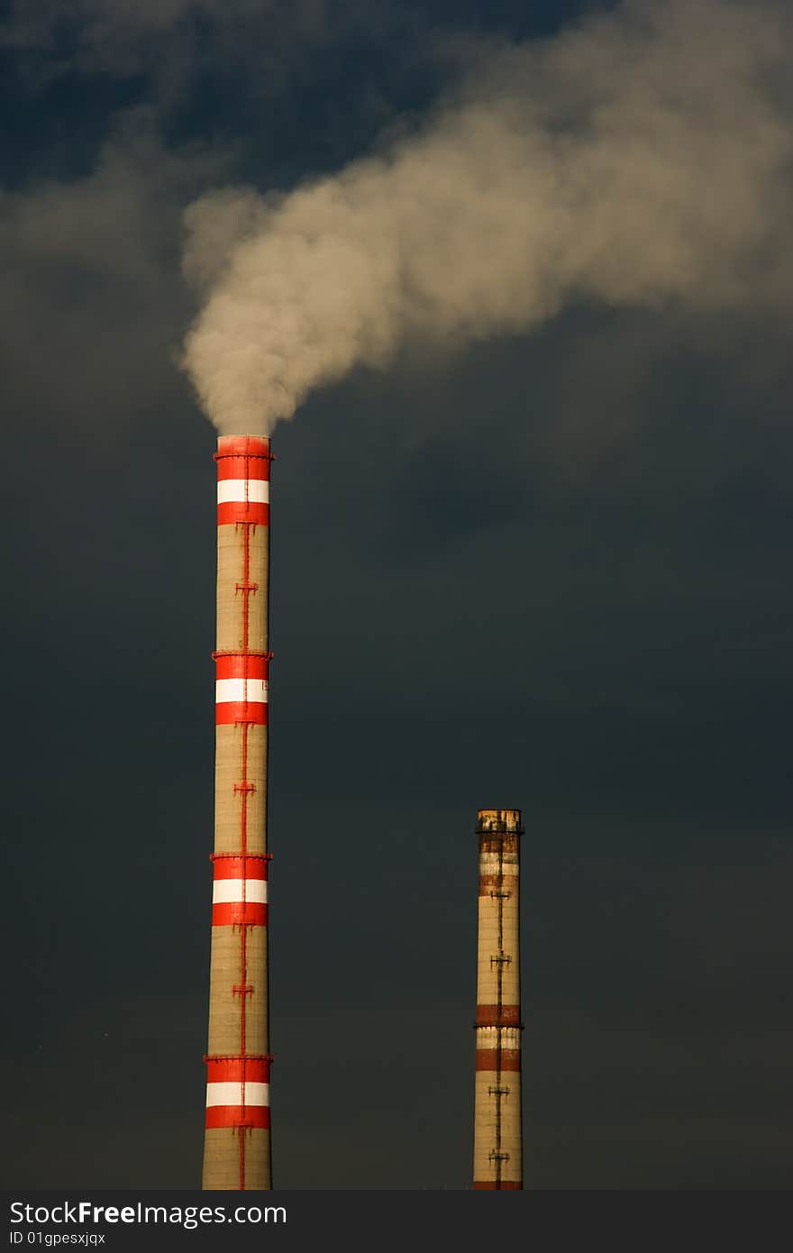 Exhaust and clouds of smoke in sky. Exhaust and clouds of smoke in sky