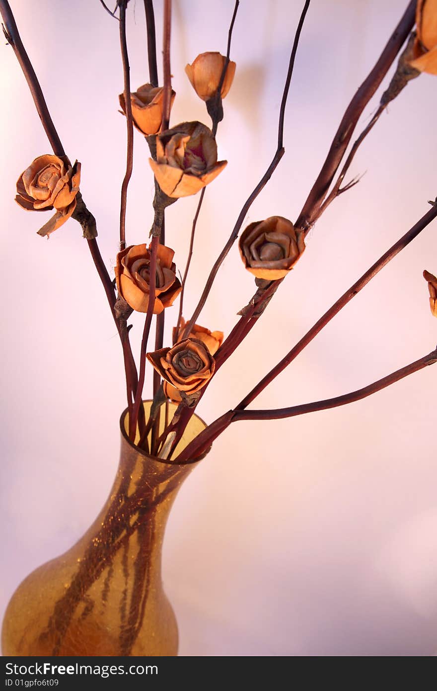 Composition of orange wooden roses