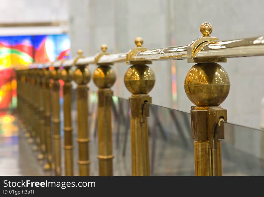 Gold railing in museum hall. Gold railing in museum hall