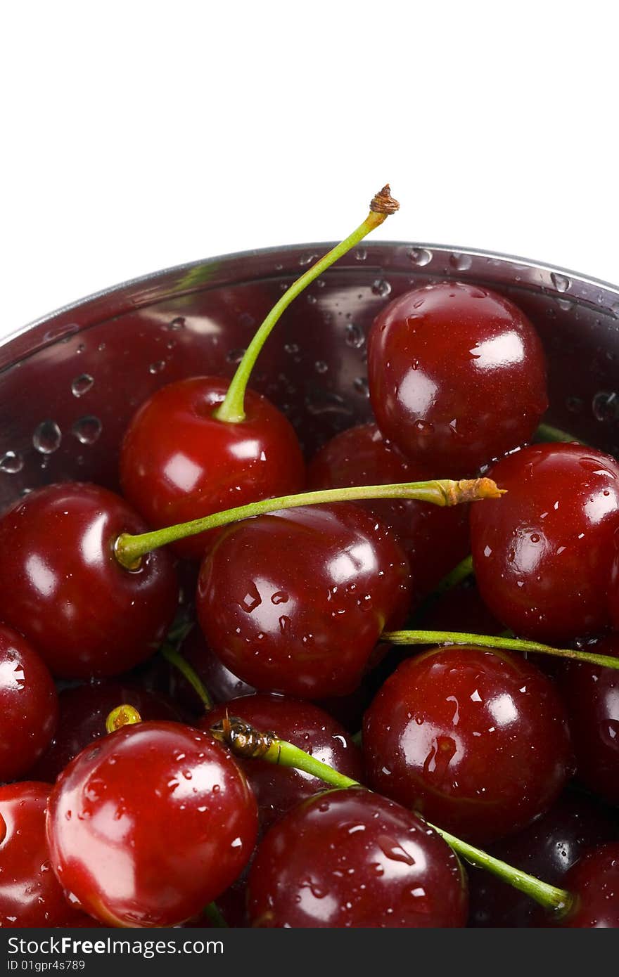 Fresh cherry in metal bowl with drops. Fresh cherry in metal bowl with drops