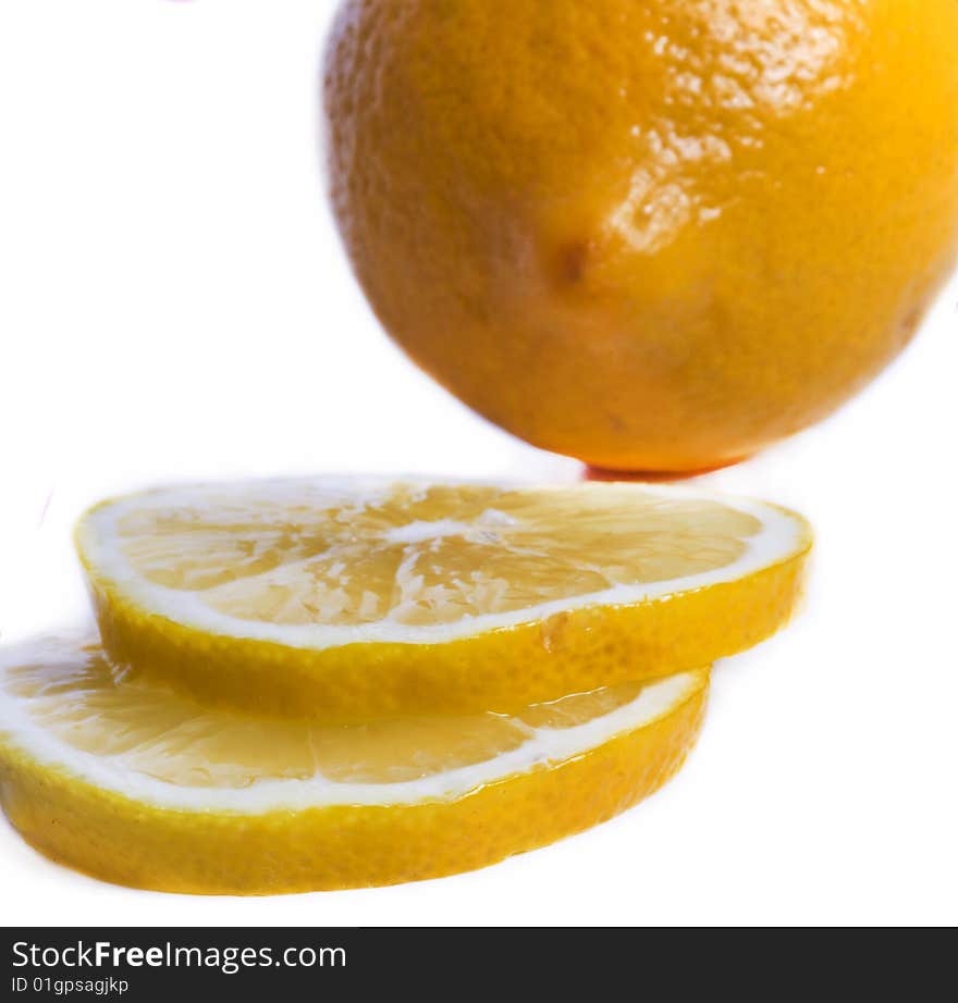 Cut lemon on white background