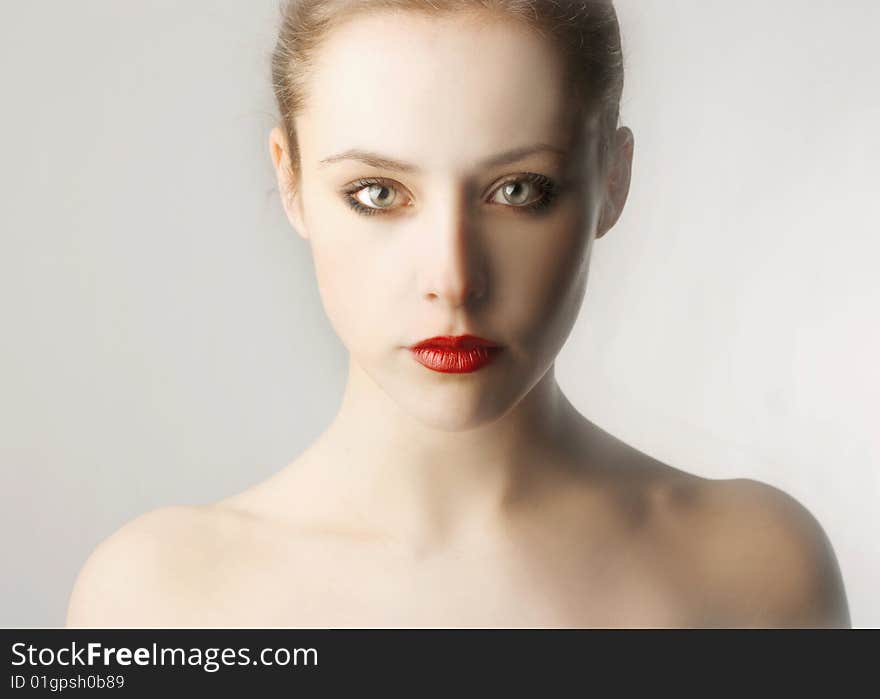 Portrait of a beautiful girl with red lips. Portrait of a beautiful girl with red lips