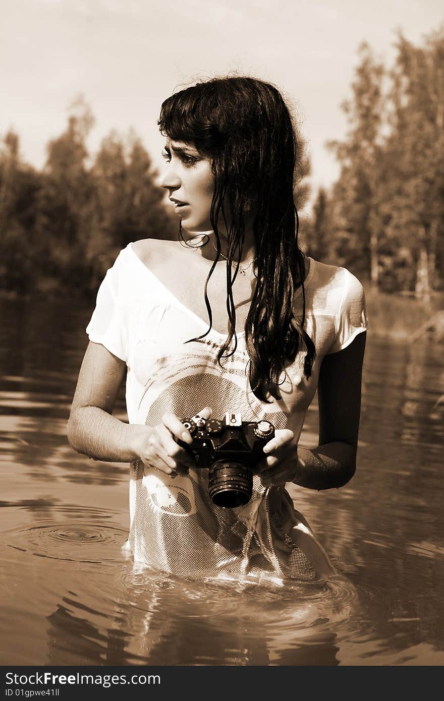 Photographer In Water