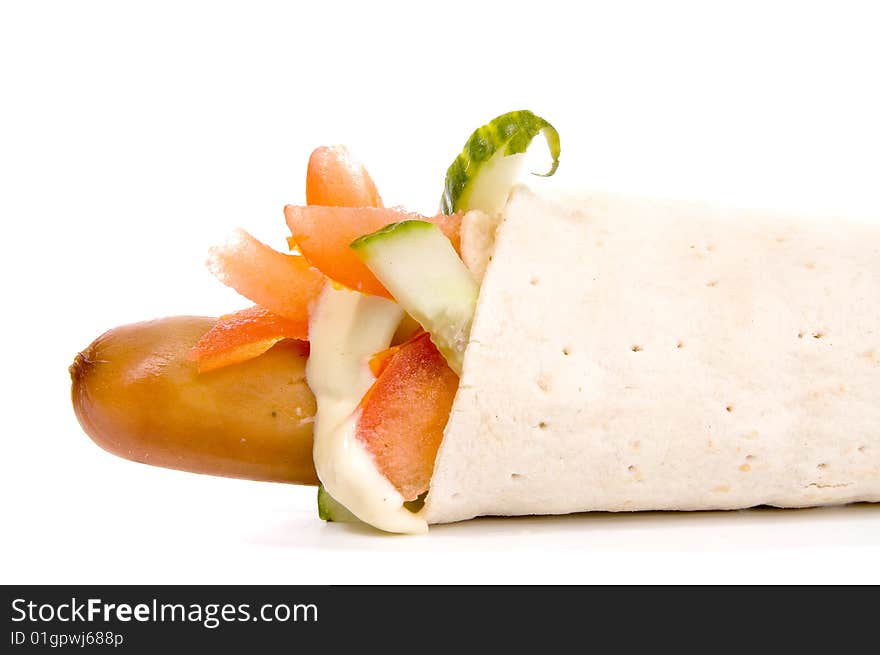 Hot dog with vegetables