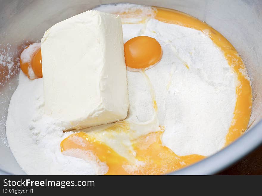 Making a cake with egg flour and butter