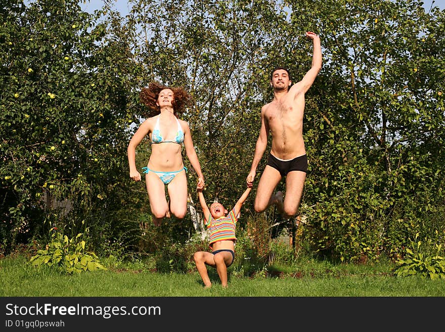 Flying parents and son outdoors