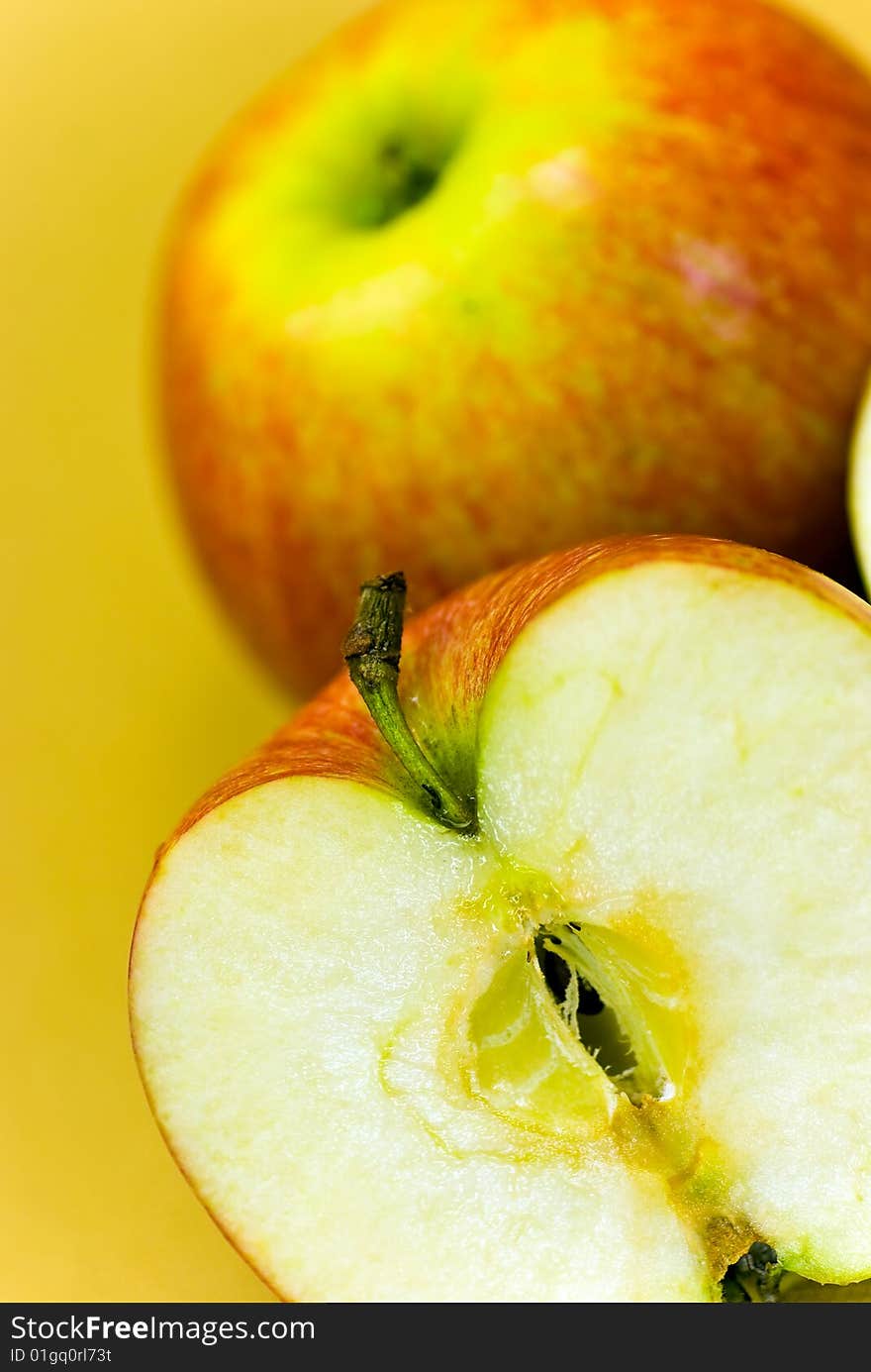 Apple Halves On Golden Background. Close Up