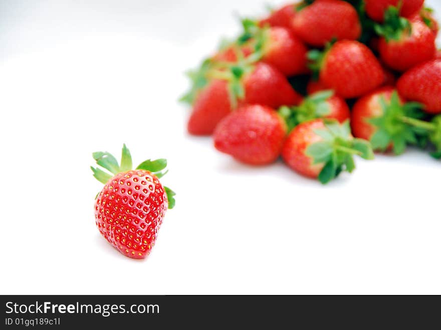 Red strawberries on white background. Red strawberries on white background.