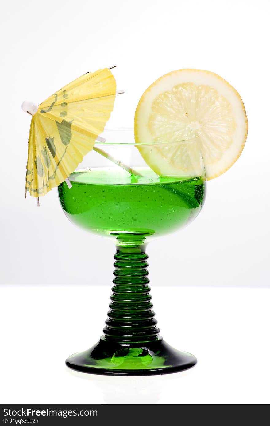 Cocktail with lime isolated on the white. Cocktail with lime isolated on the white